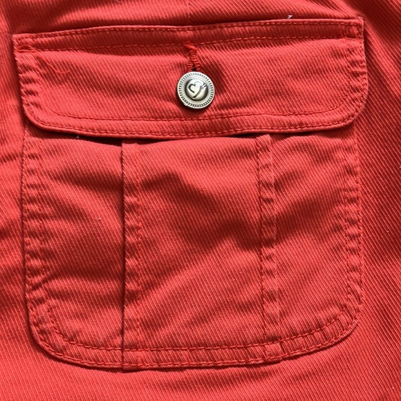 Light orange jean skirt with front and back pockets w/attached stretch shorts. - Picture 5 of 12